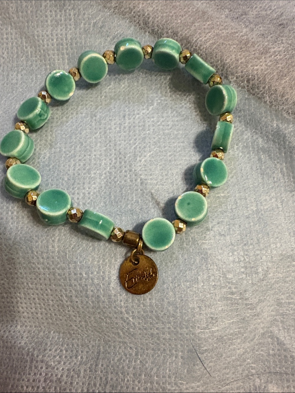 Erimish Island Green Beaded Stretch Bracelet with Gold Accent Charm